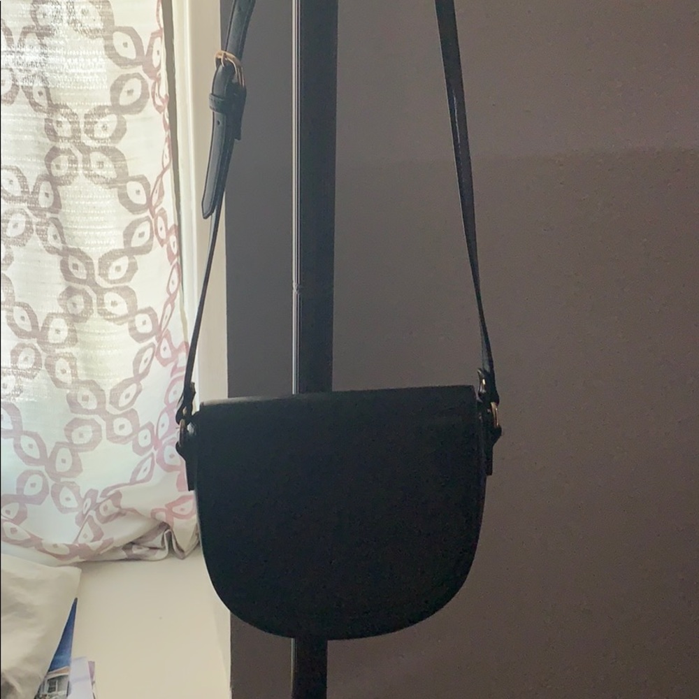 Black medium flap bag. Slightly used